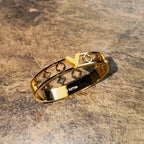 Monogram Icon V Cut-Out Bangle – Polished Gold Finish