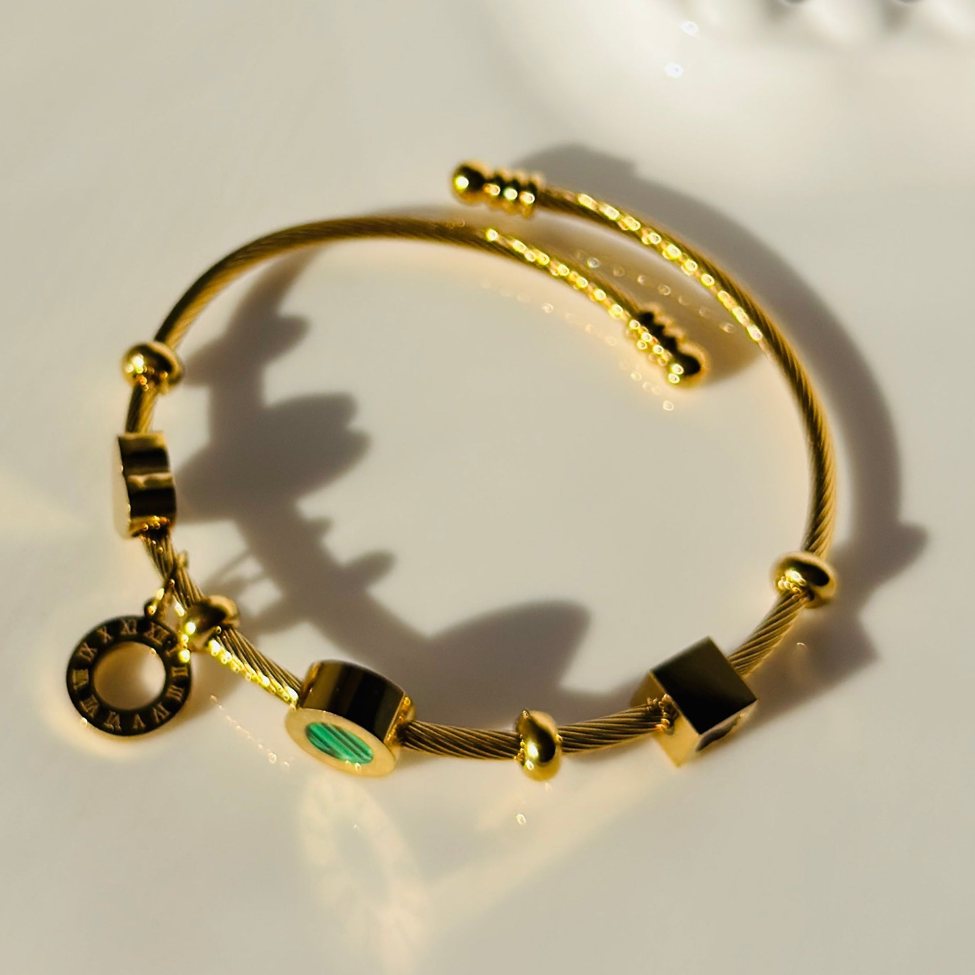 Gold Stainless Steel Cable Bracelet with Roman Numeral Charms – Adjustable & Non-Tarnish