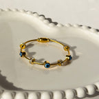 Evil Eye Bead Accent Bangle Bracelet – Gold Toned & Tarnish Resistant