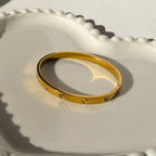 Screw & Crystal Accent Bangle Bracelet – Gold Toned & Tarnish Resistant