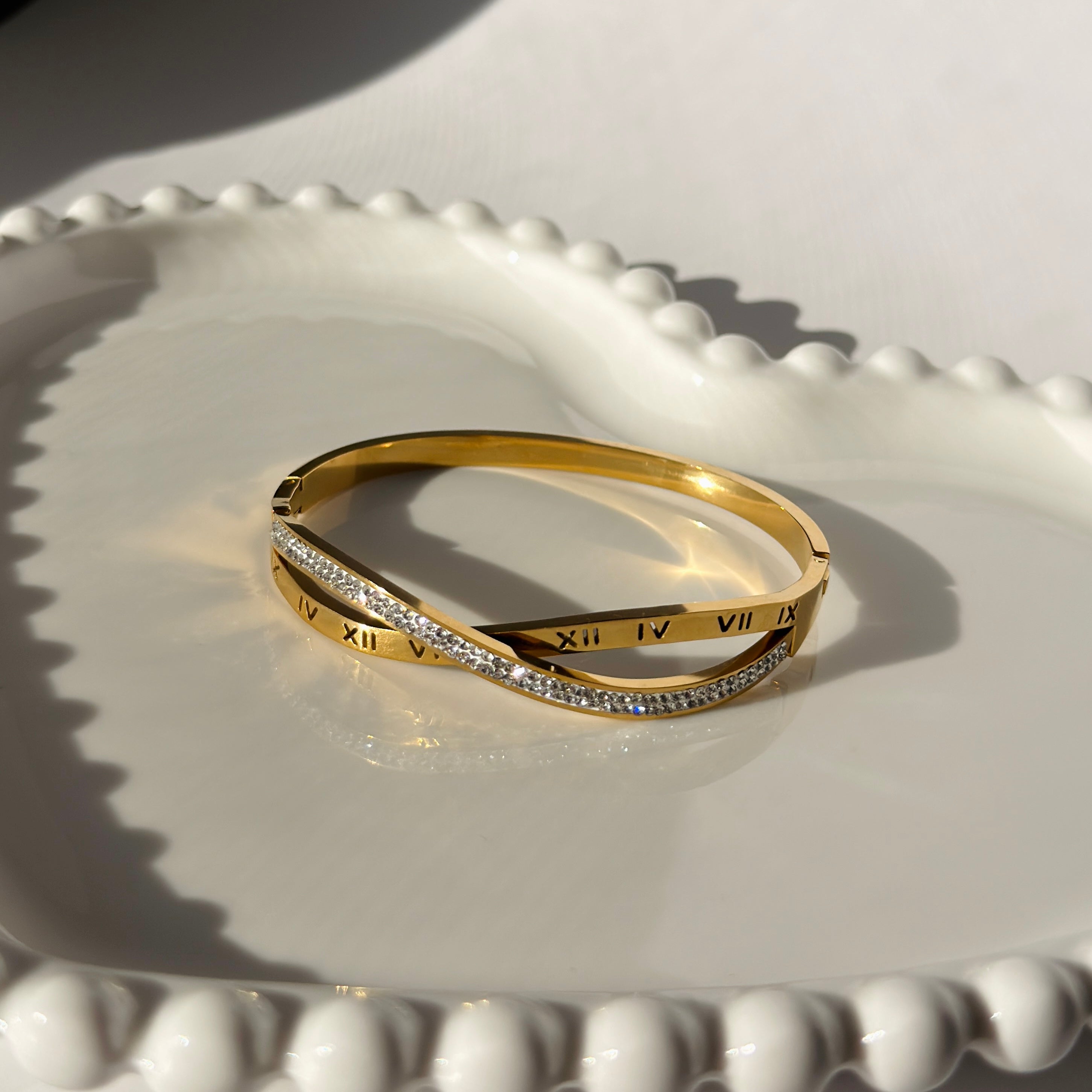 Twisted Roman Numeral & Crystal Accent Bangle – Gold Toned & Tarnish Resistant