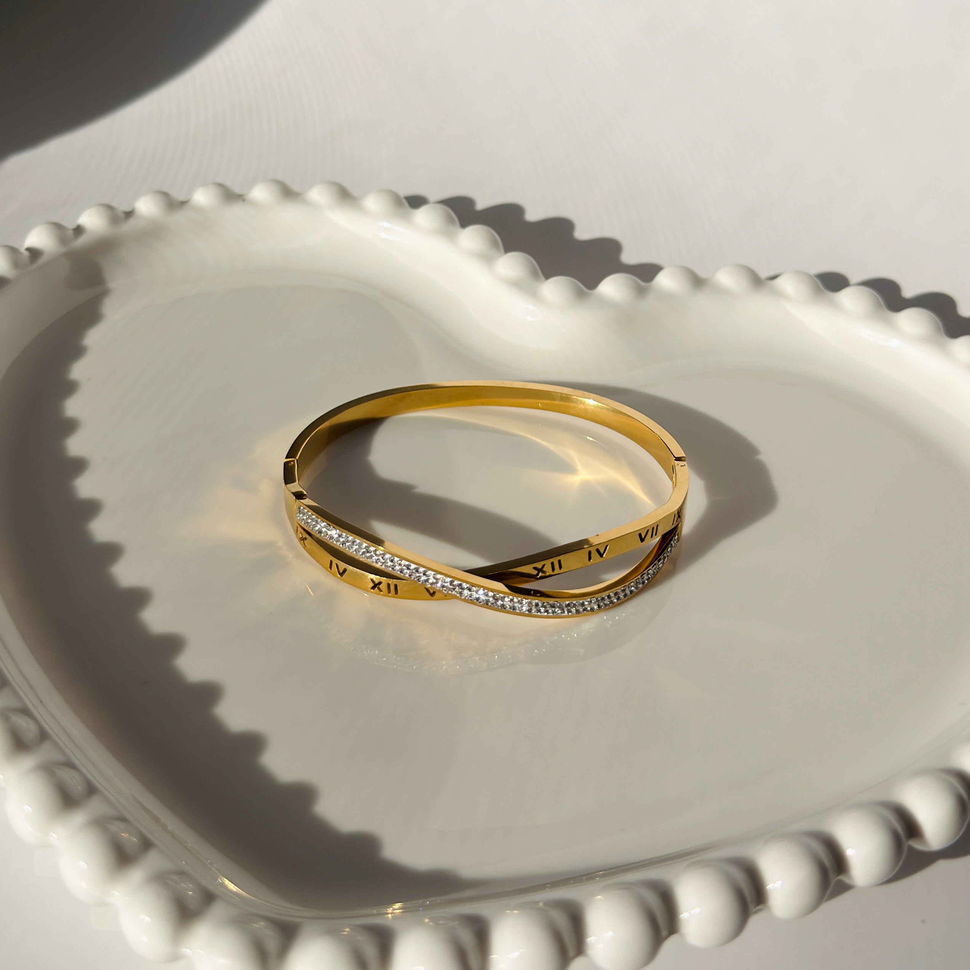 Twisted Roman Numeral & Crystal Accent Bangle – Gold Toned & Tarnish Resistant