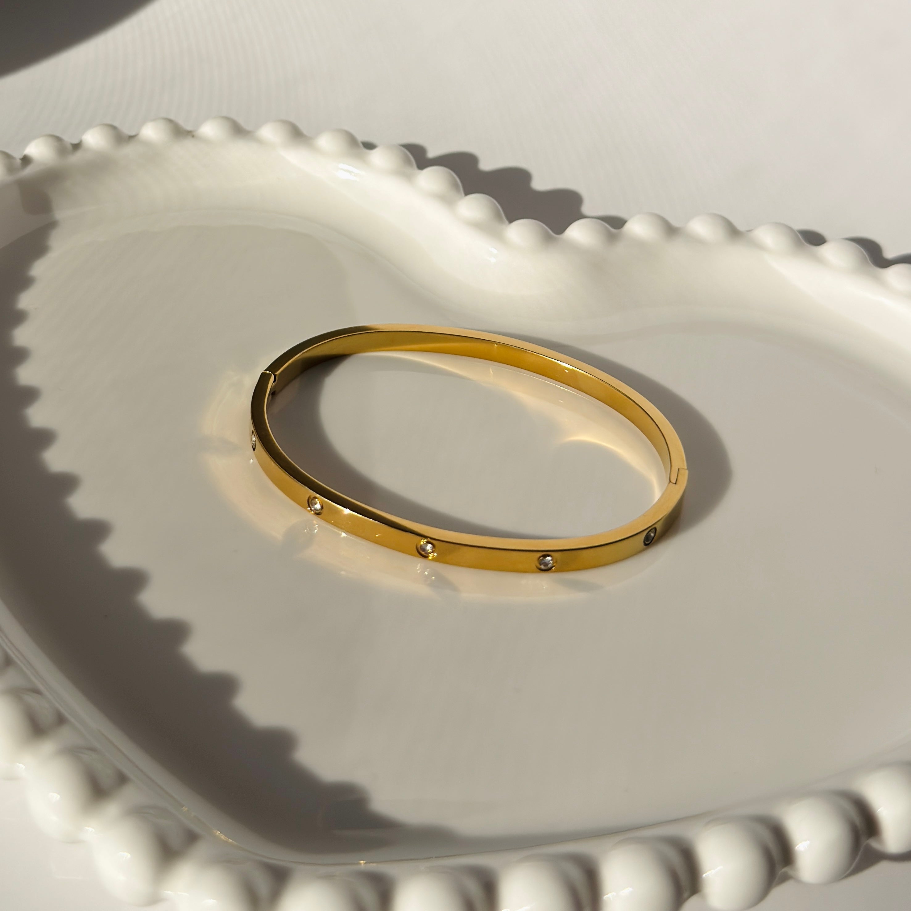 Screw & Crystal Accent Bangle Bracelet – Gold Toned & Tarnish Resistant