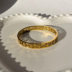 Embossed Floral Pattern Bangle Bracelet – Gold Toned & Tarnish Resistant