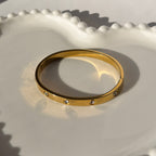 Screw & Crystal Accent Bangle Bracelet – Gold Toned & Tarnish Resistant