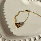 Interlocking Roman Numeral Ring & Crystal Accent Bracelet – Gold Toned & Tarnish Resistant