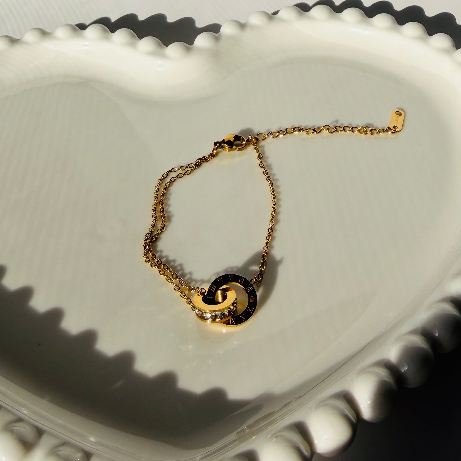 Interlocking Roman Numeral Ring & Crystal Accent Bracelet – Gold Toned & Tarnish Resistant