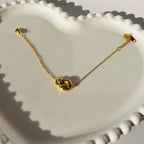 Interlocking Love Knot Accent Bracelet – Gold Toned & Tarnish Resistant