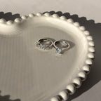 Double ring with silver plating and zircons