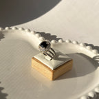 Silver plated ring with heightened stone in elegant colors