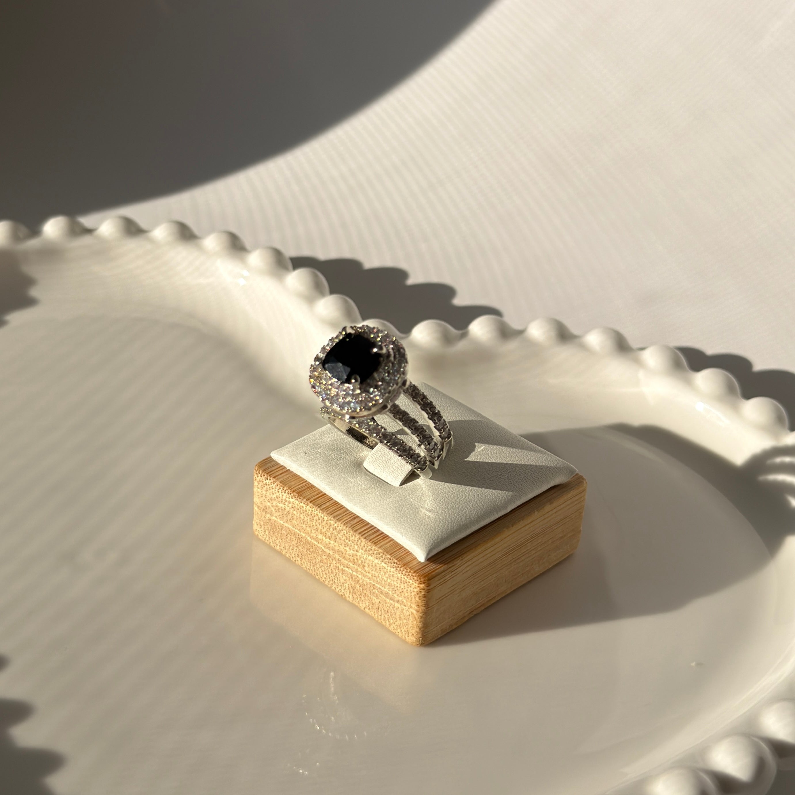 Silver plated ring with heightened stone in elegant colors