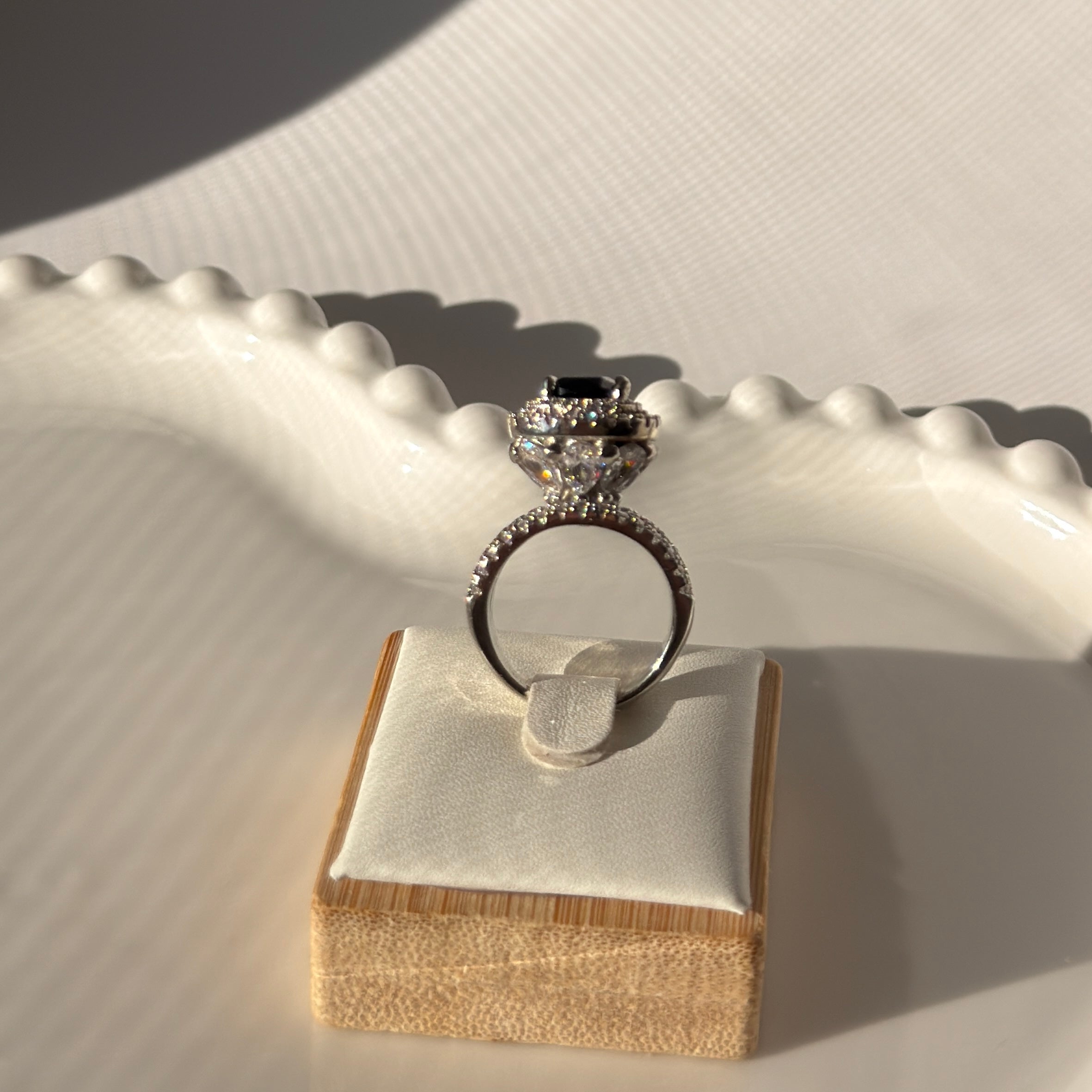 Silver plated ring with heightened stone in elegant colors