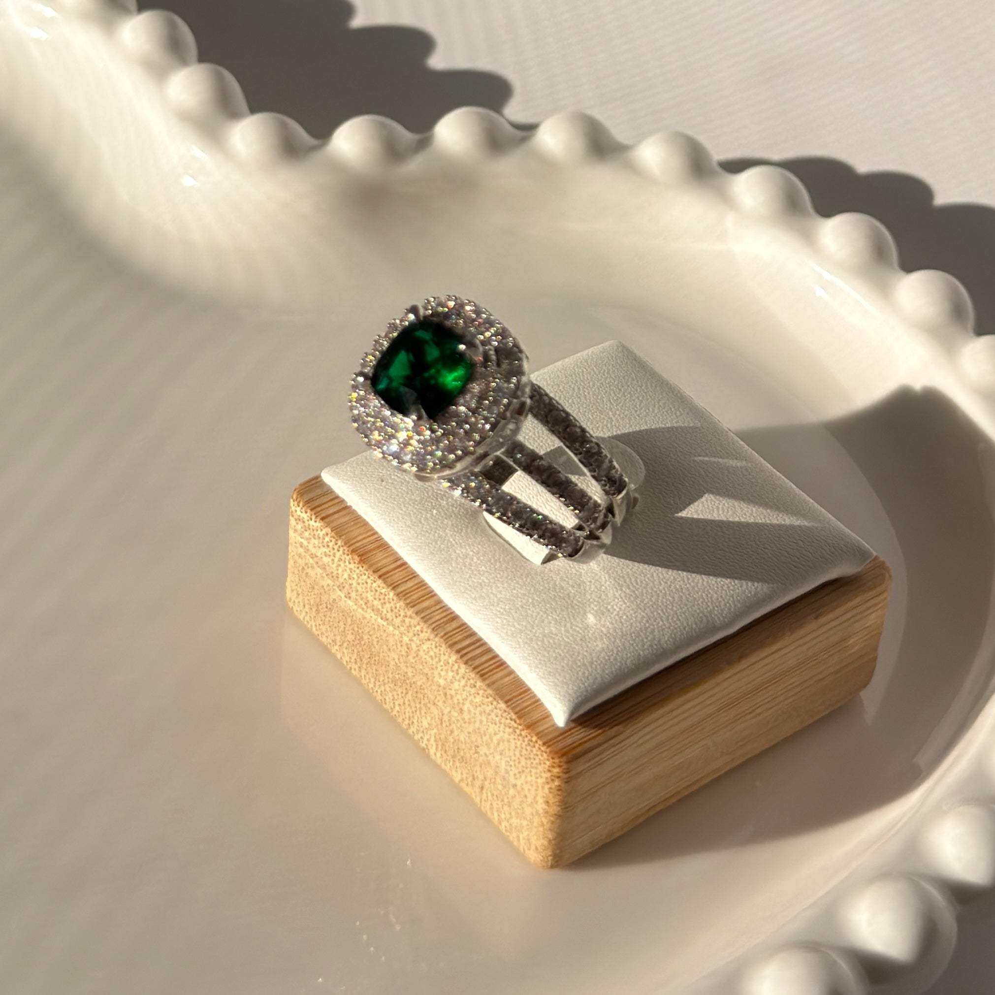 Silver plated ring with heightened stone in elegant colors