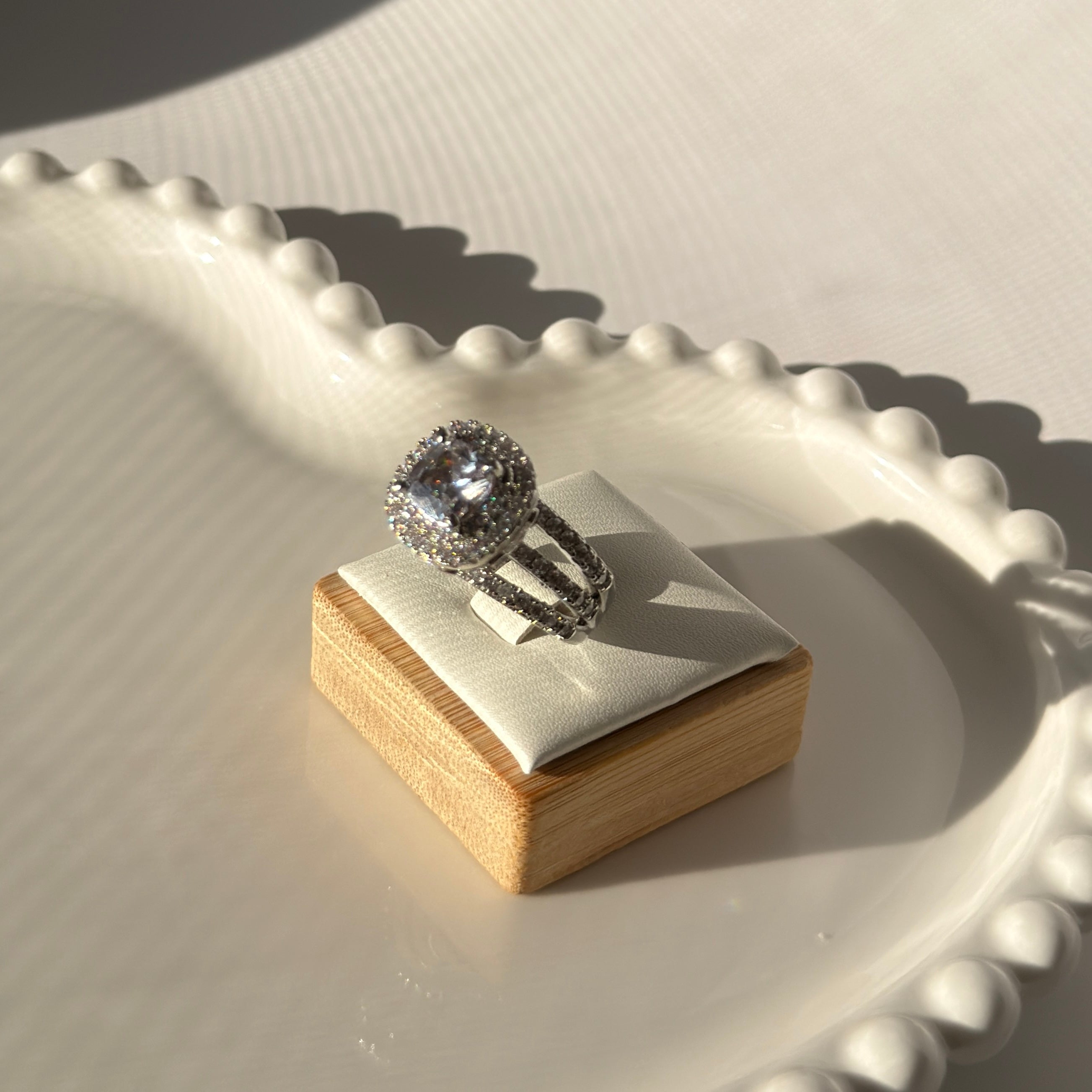 Silver plated ring with heightened stone in elegant colors